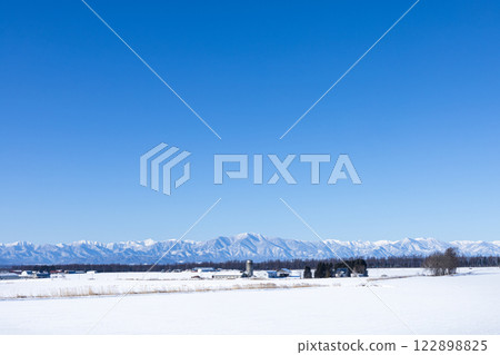 A pleasant view of the Tokachi Plain on a clear winter day A pleasant view of the Tokachi Plain on a clear winter day 122898825