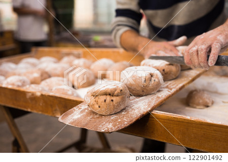Bread preparation. loaves of dough before baking 122901492