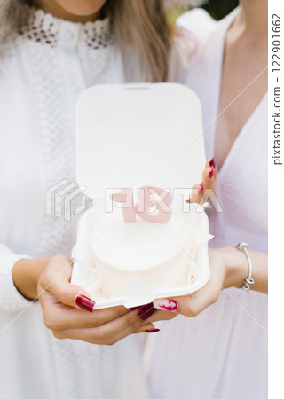 Twin Sisters Celebrating 18th Birthday With Cake Twin Sisters Celebrating 18th Birthday With Cake 122901662