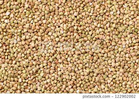 Organic buckwheat seed texture background, Food ingredient Organic buckwheat seed texture background, Food ingredient 122902002
