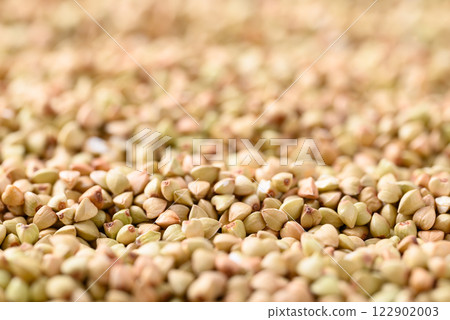 Organic buckwheat seed texture background, Food ingredient Organic buckwheat seed texture background, Food ingredient 122902003