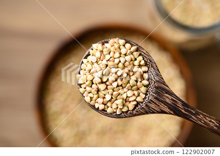 Organic buckwheat seed in wooden spoon, Food ingredient Organic buckwheat seed in wooden spoon, Food ingredient 122902007