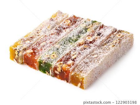 Colorful Turkish delight featuring nuts and fruit flavors on a white background 122903198