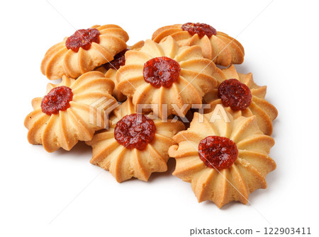 Cookies with jam on top arranged neatly on a white background showcasing the dessert's intricate design Cookies with jam on top arranged neatly on a white background showcasing the dessert's intricate design 122903411