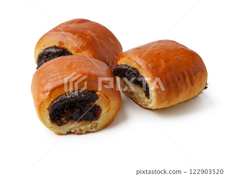 Soft and fluffy sweet rolls filled with rich chocolate paste in a delightful display on a white background 122903520