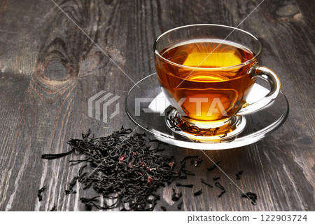 Cup of Tea on a dark wood 122903724