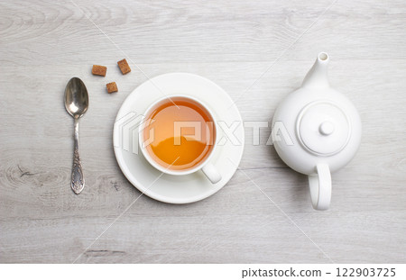 Cup of Tea on a light wooden background Cup of Tea on a light wooden background 122903725