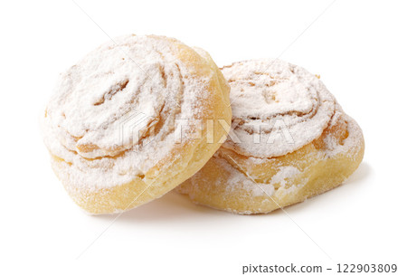 Delicious cinnamon rolls dusted with powdered sugar ready to be enjoyed with coffee or tea during a cozy afternoon snack 122903809