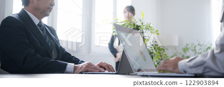 Scene of working in a brightly lit indoor office, boss and subordinate banner, no faces Scene of working in a brightly lit indoor office, boss and subordinate banner, no faces 122903894
