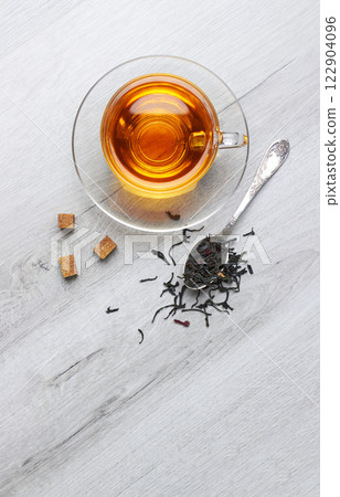 Cup of Tea on a light wooden background Cup of Tea on a light wooden background 122904096