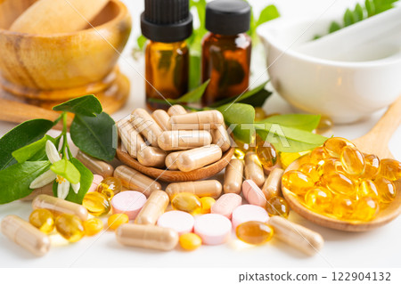 Alternative medicine herbal organic capsule, mineral, drug with herbs leaf natural supplements for healthy good life. 122904132