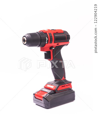 a cordless electric screwdriver on a white background. isolate vertical 122904219