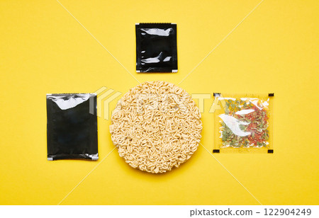 Instant noodles set on yellow Instant noodles set on yellow 122904249