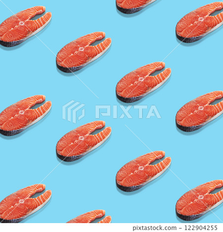Piece of a salmon on blue background. Top view. Pop art design. 122904255