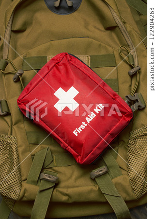First Aid Kit on army backpack First Aid Kit on army backpack 122904263