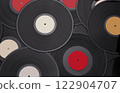 Vinyl records on a stack. Analog sound. Vinyl records background 122904707