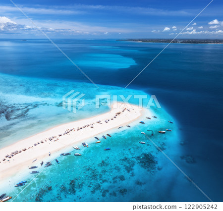 Aerial view of island, sandbank in blue sea, white sand, boats Aerial view of island, sandbank in blue sea, white sand, boats 122905242