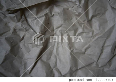 a crumpled brown wrapping paper, texture, background a crumpled brown wrapping paper, texture, background 122905703