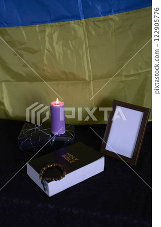 funeral of Ukrainian , photo frame, candles, marble urn for ashes, holy bible and acspiritual bracelet with black cross funeral of Ukrainian , photo frame, candles, marble urn for ashes, holy bible and acspiritual bracelet with black cross 122905776