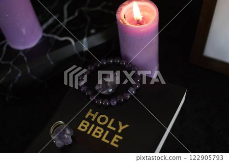 funeral, photo frame, candles, an urn for ashes, holy bible and jewelry with precious stones made from the ashes of the deceased funeral, photo frame, candles, an urn for ashes, holy bible and jewelry with precious stones made from the ashes of the deceased 122905793