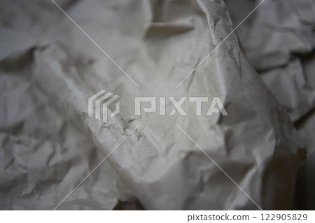 a crumpled brown wrapping paper, texture, background a crumpled brown wrapping paper, texture, background 122905829