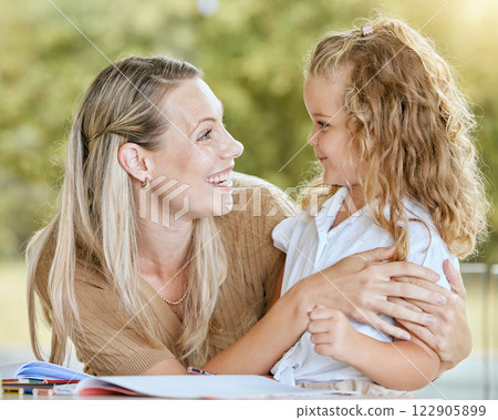 Education, mother and child student writing school homework, learning knowledge and lesson in a notebook. Happy, smile and proud math tutor helping and teaching her creative child in the family house 122905899