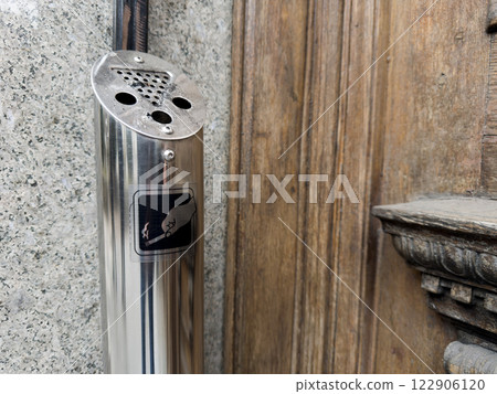 Steel outdoor ashtray for heavy smokers on building entrance Steel outdoor ashtray for heavy smokers on building entrance 122906120