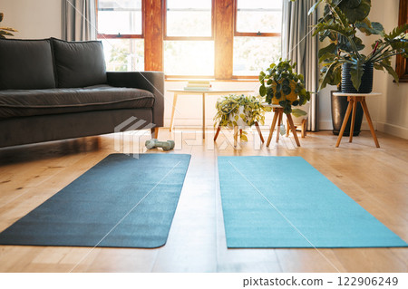 Yoga mat, home workout and empty space background in house for exercise, fitness and pilates on living room floor. Apartment interior lounge for sports training, body wellness and healthy lifestyle Yoga mat, home workout and empty space background in house for exercise, fitness and pilates on living room floor. Apartment interior lounge for sports training, body wellness and healthy lifestyle 122906249
