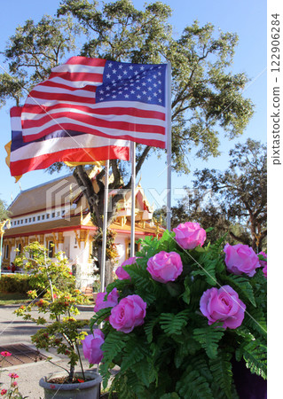 American Flag With Thai Flag at Buddhist Temple in Tampa Florida 122906284
