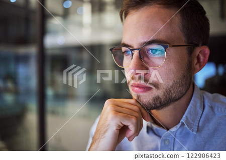 Man, work and reading with reflection on glasses in office thinking of planning strategy for business. Businessman, working and screen of tech at company, workplace or corporate in overtime in night Man, work and reading with reflection on glasses in office thinking of planning strategy for business. Businessman, working and screen of tech at company, workplace or corporate in overtime in night 122906423