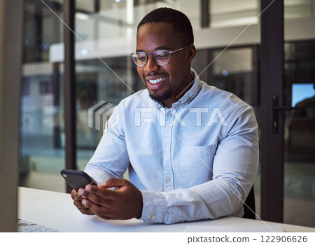 Black businessman, phone and networking in night office with digital marketing schedule, social media calendar and crm app. Smile, happy or motivation worker with mobile advertising b2b software idea Black businessman, phone and networking in night office with digital marketing schedule, social media calendar and crm app. Smile, happy or motivation worker with mobile advertising b2b software idea 122906626