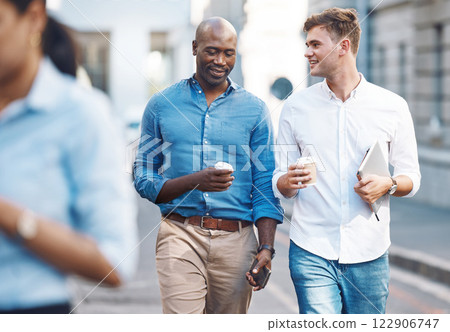 Men, walk and street with takeaway coffee while talk, smile and relax at lunch break. Black man, colleague and diversity in city at tea time, walking to office or workplace in discussion or talking Men, walk and street with takeaway coffee while talk, smile and relax at lunch break. Black man, colleague and diversity in city at tea time, walking to office or workplace in discussion or talking 122906747