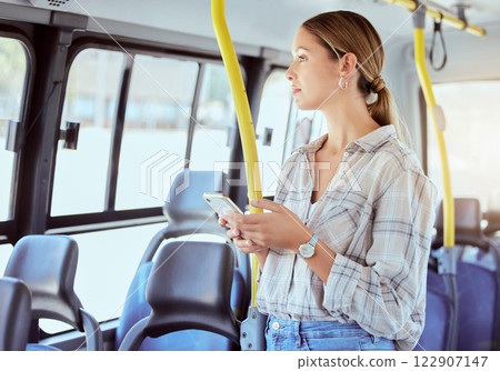 Woman, bus travel and phone on public transportation while thinking and using social media or internet app for information about city traveling. Female passenger with 5g network cellphone in town 122907147