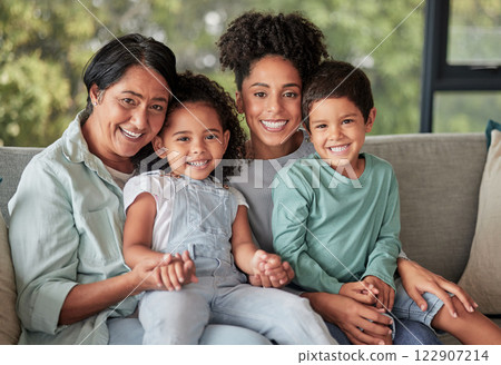 Happy family, grandmother and mom with her children in a portrait at home enjoying quality time on mothers day. Senior woman, kids and their young mum smiling, bonding and relaxing in Colombia 122907214