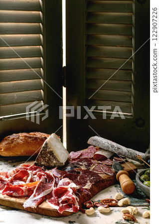 Snack board with Jamon Iberico Snack board with Jamon Iberico 122907226