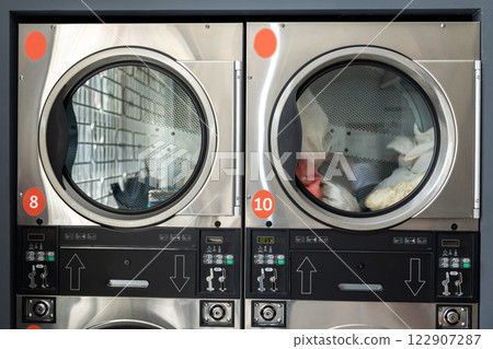 Close up of washing machines in a laundry Close up of washing machines in a laundry 122907287