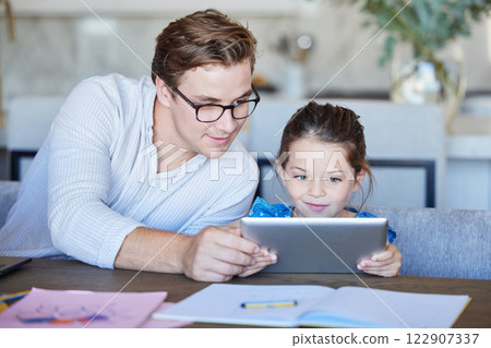 Education, learning and father and child on digital tablet, distance learning at tablet at home together. Happy, girl and parent bonding during homeschooling lesson, online educational program Education, learning and father and child on digital tablet, distance learning at tablet at home together. Happy, girl and parent bonding during homeschooling lesson, online educational program 122907337