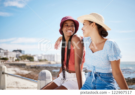 Beach smile, travel summer and friends happy on a holiday in nature of Miami, excited about vacation time together and talking by the ocean. Mockup of African women in communication by the sea 122907517
