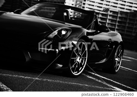 sleek black sports car 122908460