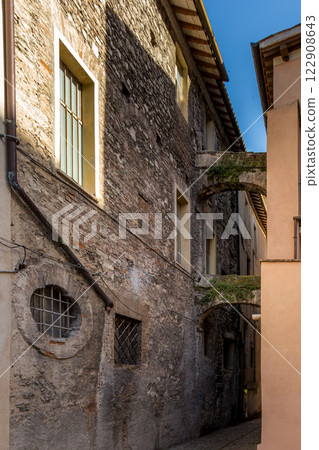 The winding narrow streets, stairs and charming architecture of Spoleto 122908643