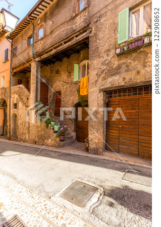 The winding narrow streets, stairs and charming architecture of Spoleto The winding narrow streets, stairs and charming architecture of Spoleto 122908652