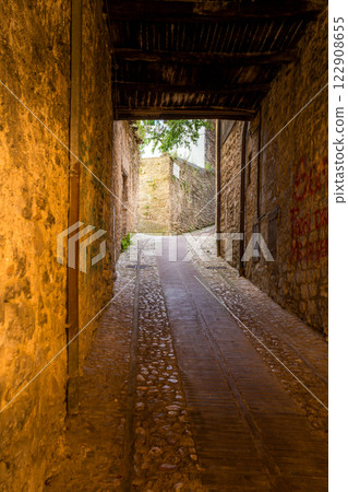 The winding narrow streets, stairs and charming architecture of Spoleto 122908655