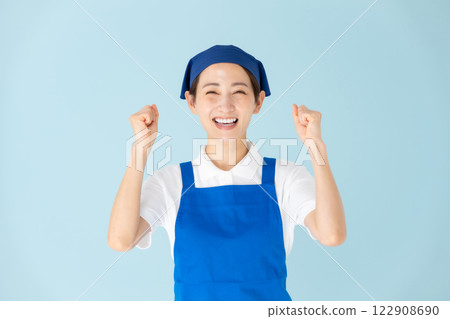 Woman, part-time, part-time job, apron, fist pump Woman, part-time, part-time job, apron, fist pump 122908690