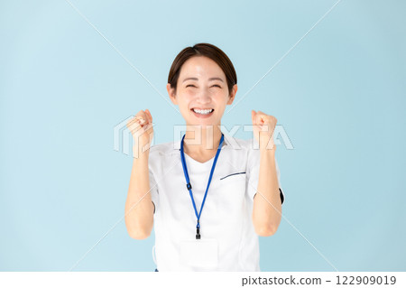 Female, white coat, nurse, medical, fist pump 122909019