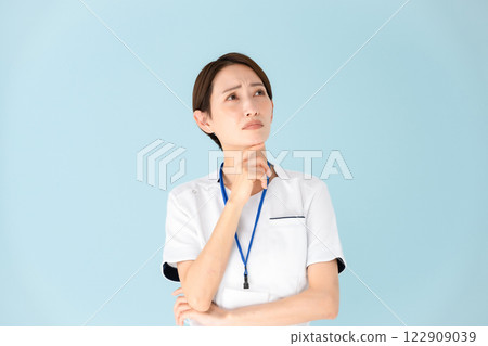 Woman, white coat, nurse, medical, worries 122909039