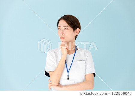 Woman, white coat, nurse, medical, worries 122909043