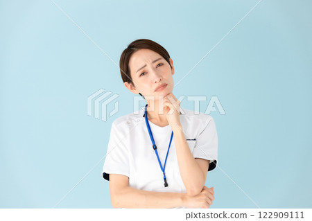 Woman, white coat, nurse, medical, worries Woman, white coat, nurse, medical, worries 122909111