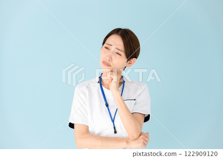 Woman, white coat, nurse, medical, worries 122909120
