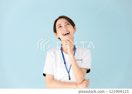Woman, white coat, nurse, medical, worries, smile 122909125