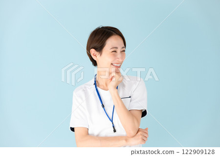Woman, white coat, nurse, medical, worries, smile 122909128